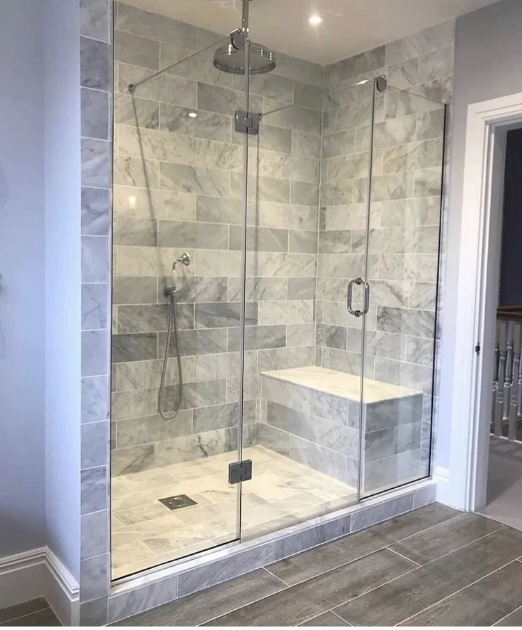 Eurostar bathroom remodeling photo showing a glass shower enclosure and tile